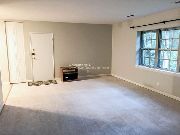 Large living room right off the kitchen - great for entertaining!