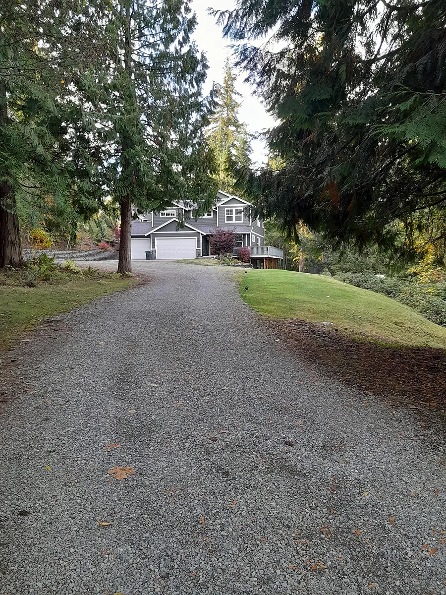 main house see from drive way - 18919 S Tapps Dr E