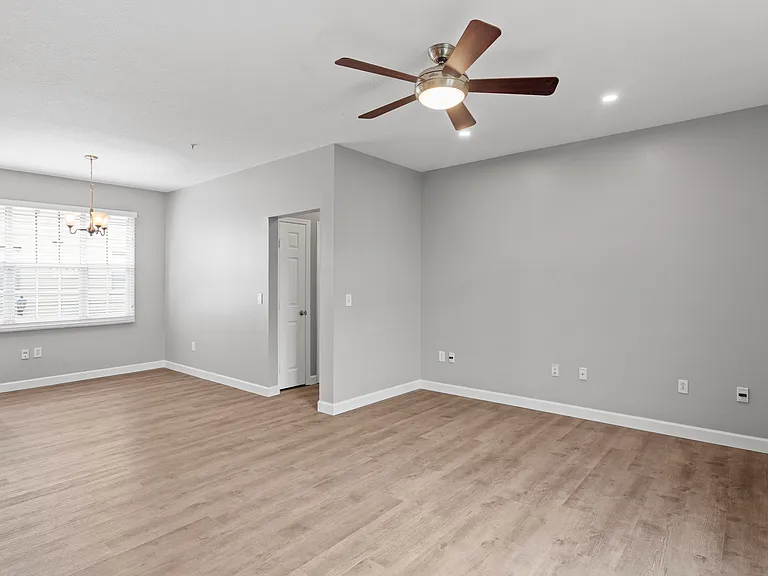 Living and dining room with an open concept and plenty of natural light