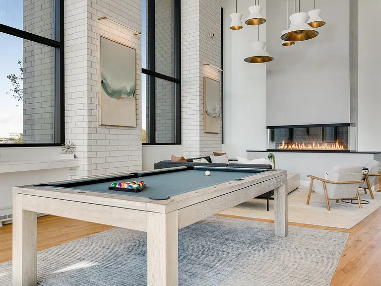 Challenge friends to a game in our vibrant lobby with a pool table and fireplace.