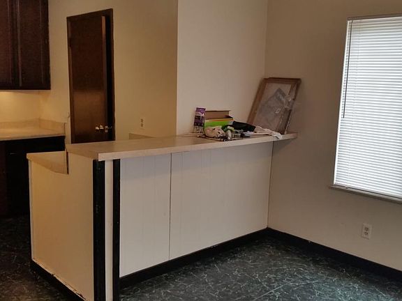 Left of kithen dine in area / Bar area