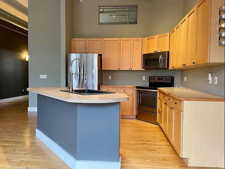 Kitchen is accessible to the full sunlight with all facing huge windows.