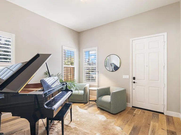 Front room as you walk in the front door.