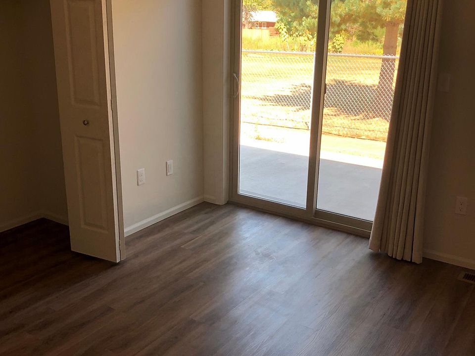 Master bedroom with sliding glass door to back