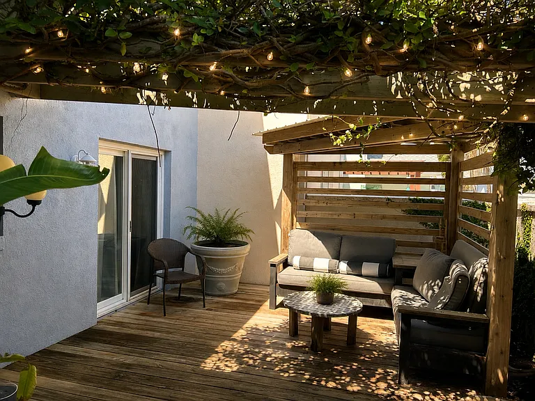 Private back patio is perfect for you to unwind with a book, sip a glass of wine, or enjoy an outdoor meal.