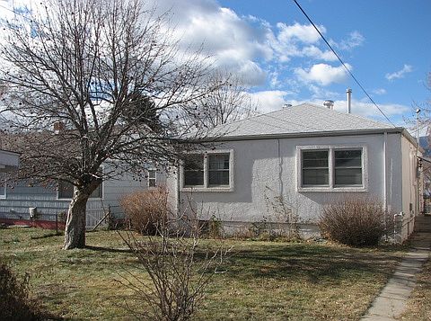 Back view with apple tree in yard