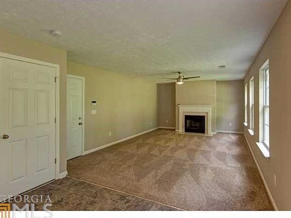 Spacious Family room area! Complete with a cozy, yet sophisticated fireplace!