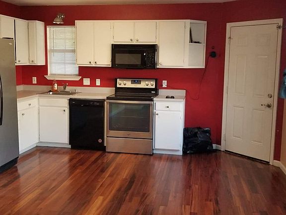 Kitchen with included appliances