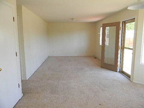 Family room w/ access to deck
