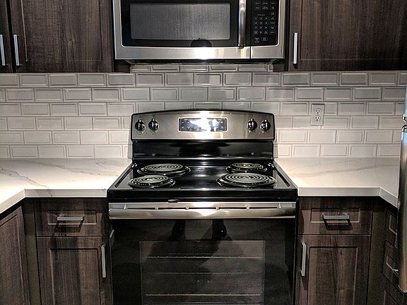 Upgraded kitchen with stainless steel appliances