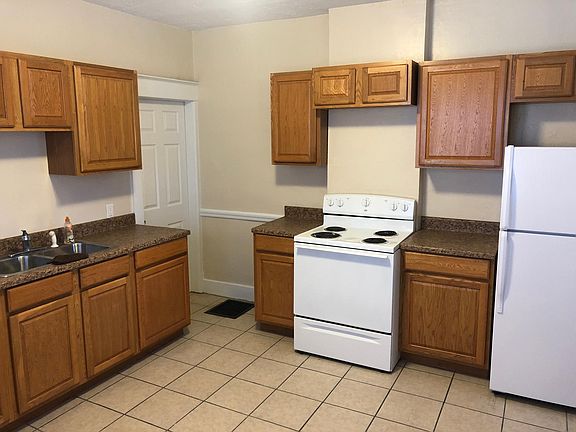 Tons of counter and cabinet space in this gigantic kitchen