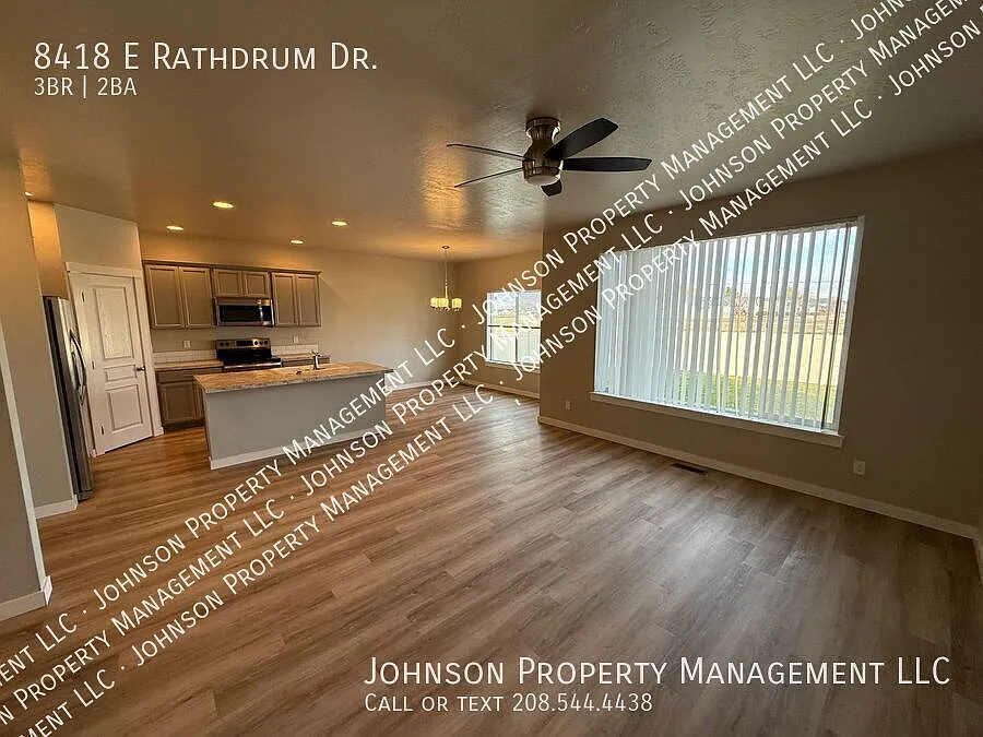 2nd living room area above garage in this 5 year old North Nampa single family! Make it your home! — Photo 2