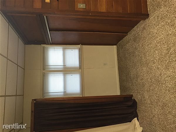 one side of bedroom