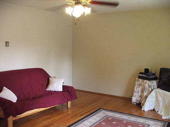 Great room with refinished wood floors