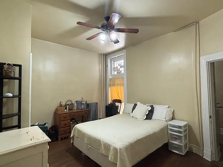 bedroom with hardwood floor