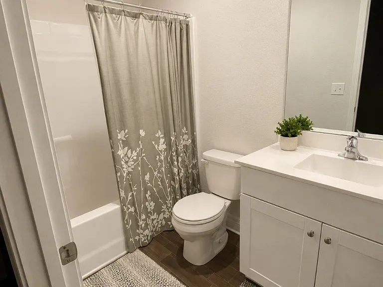 En-Suite Bathroom 2 (with tub and shower). Each bedroom has its own private bathroom and walk-in closet!