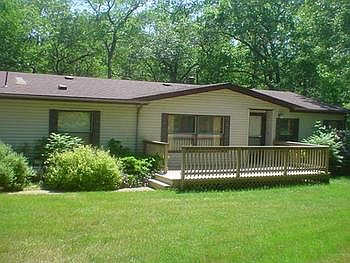 Year round home or summer get away - your choice.  This 3 bedroom, 2 bath home is ready for you.  Roof 5 years old, 2 large decks, 2 car attached garage, central air, L.P. generator, ceiling fans, 2"x6" studs fully insulated, all on little over 1 acre.  Plenty of room to park a RV or Boat.  Call today! 