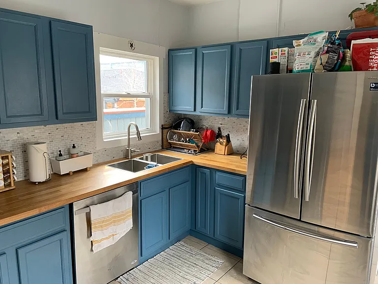 Renovated kitchen with new dishwasher, Samsung large capacity refrigerator.