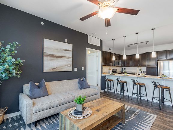Hardwood-Style Flooring Throughout Main Living Areas *
