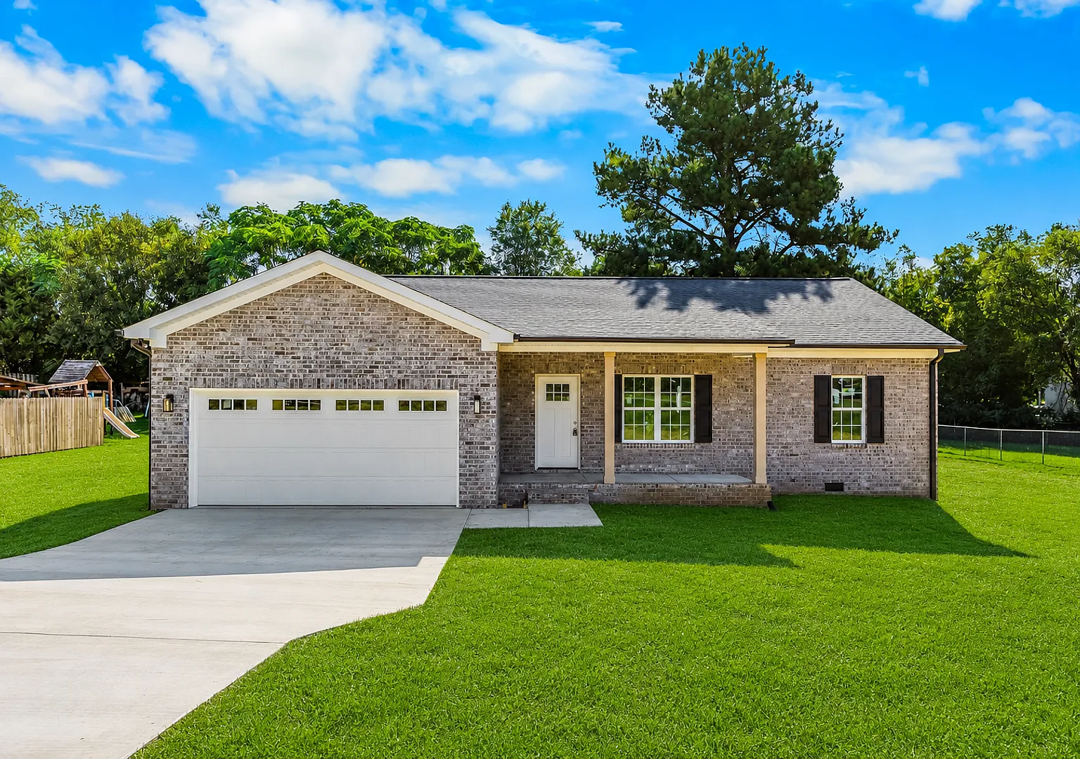 Brand-New Three-Bedroom Brick Home with Two-Car Garage — Photo 1