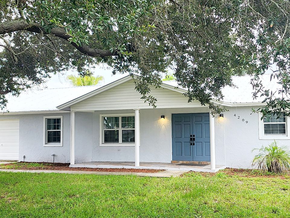 Beautiful front entrance, double door for glam look, aluminum roof.