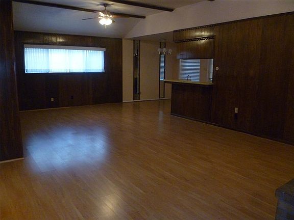 Opposite View of Den Open to Kitchen & Dining Area