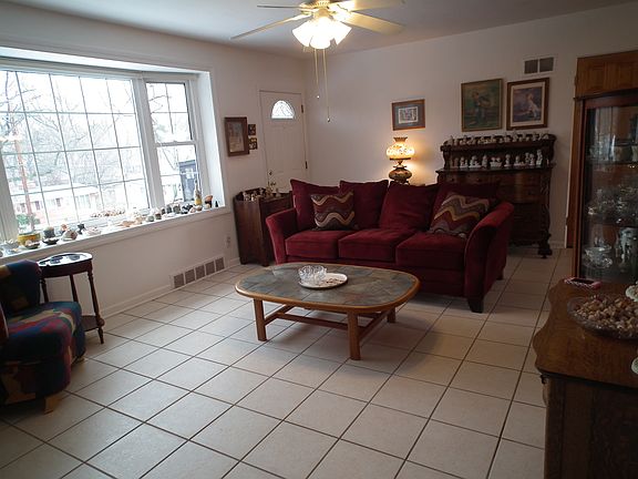 Living room with fireplace ,large bay window