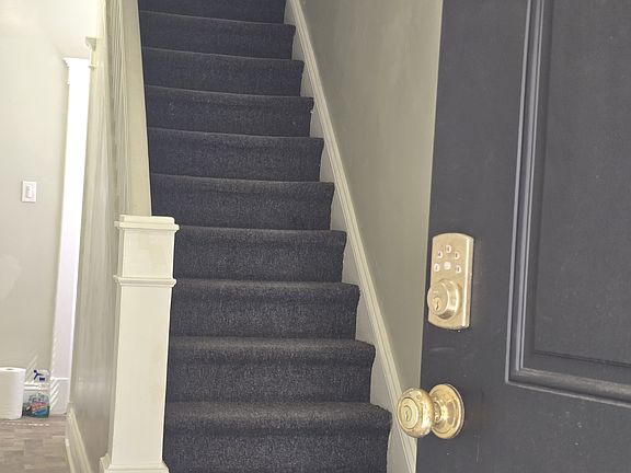 View of staircase to the 2nd floor.