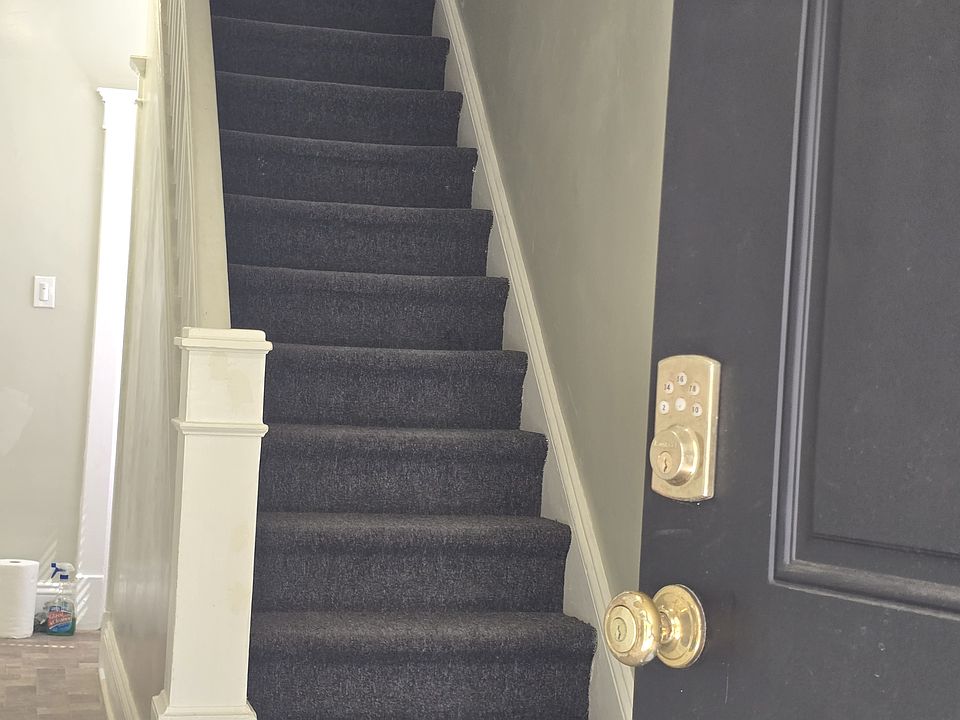 View of staircase to the 2nd floor.