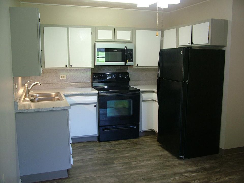 Newly remodeled kitchen. New plank flooring, refinished counter tops, new sink and faucet. New micro-wave. Painted cabinets. Newer appliances.
