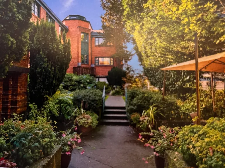 Courtyard is gated and beautifully landscaped.