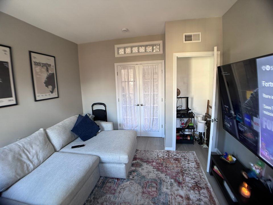 Front bedroom/office/living room with french doors