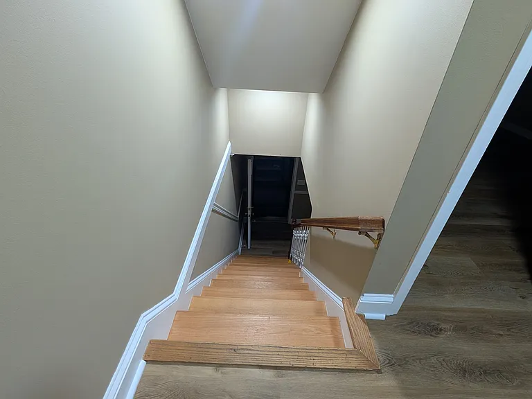 Stairs up to 2 bedroom and 1 full bathroom .