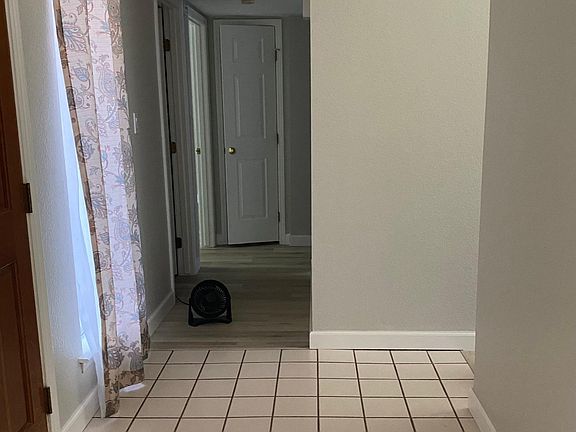Entrance facing towards hall bath and front bedroom and small linen closet (there are two)