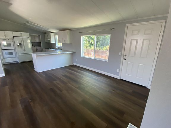 Front door and kitchen