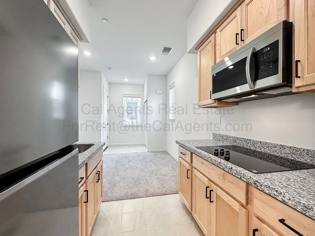 Building Photo - 3712-3712A Scribe Way #A