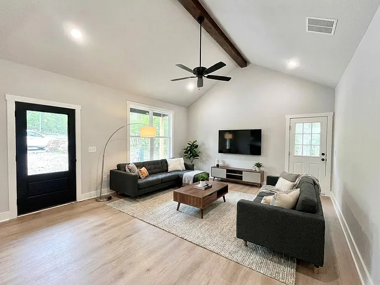Open concept living room with tons of light.