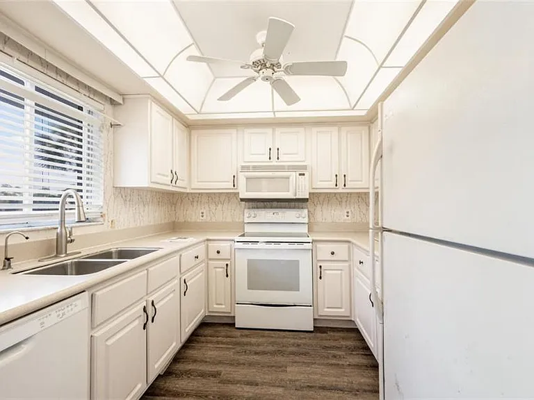 5635 Rattlesnake Hammock Rd #D-203 — Photo 1