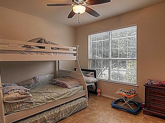 Office being used as bedroom.