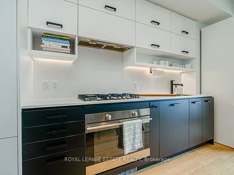1888 Queen St E #211 — Photo 14