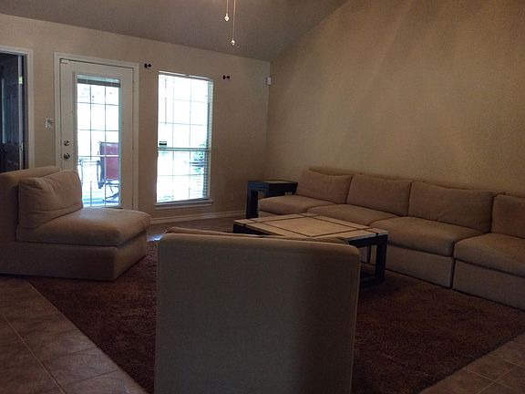 Family room with vaulted ceilings. 