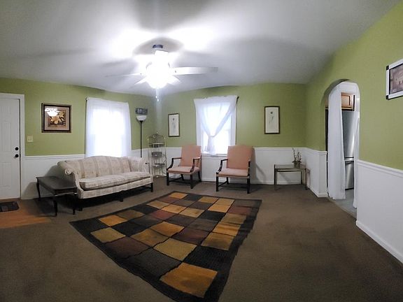 The living room - spacious, with windows and bright
