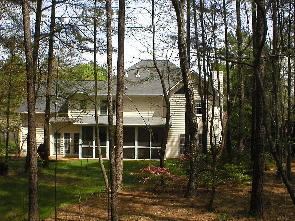 View from wooded back yard... looking towards screened in porch