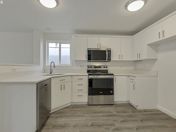 5th image of 585 SW 207th Ave