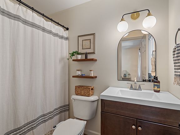 En-suite master bathroom with bidet, dimmable lighting and a tub/shower combination.