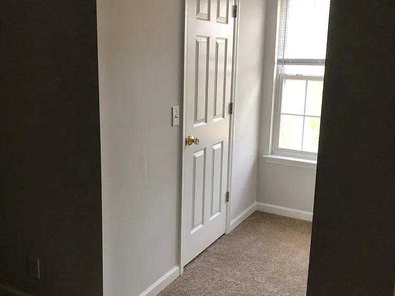 First bedroom hall that leads to the closet and bathroom