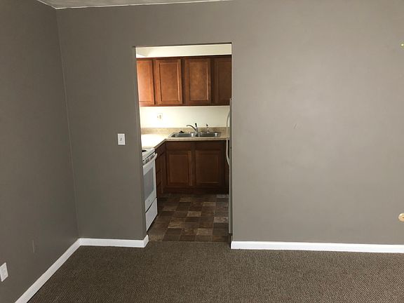 Looking at kitchen area.