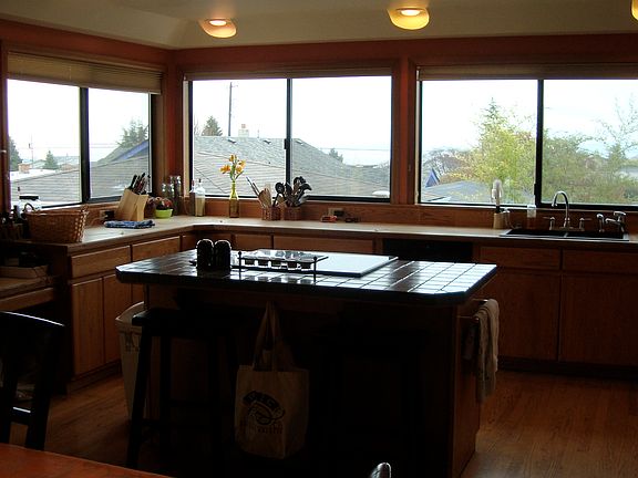 Kitchen w/ island and views