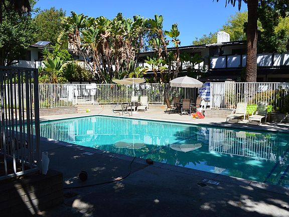 Large salt water pool in center of property.