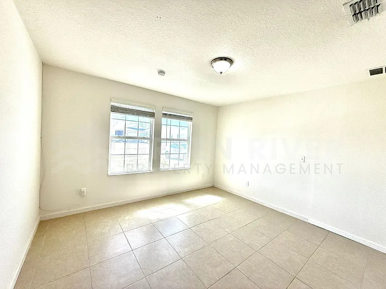 8704 Lake George Cir W — Photo 29